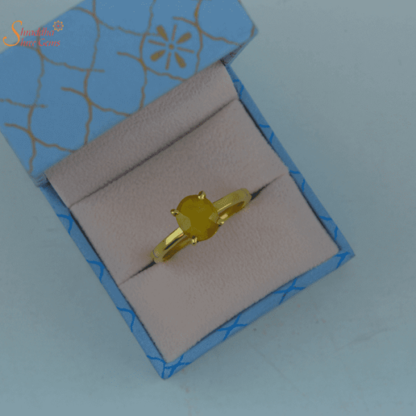 gold and silver yellow sapphire ring