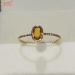 yellow sapphire gemstone ring in panchdhatu