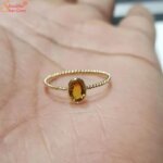 yellow sapphire gemstone ring in panchdhatu